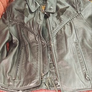 A female leather American made in the USA medium size biker jacket